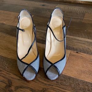 Christian Louboutin black and white pumps